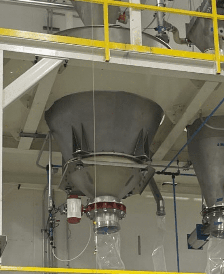 Bin activator below hopper