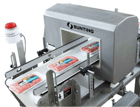 Bunting conveyor metal detector inspecting packaged products