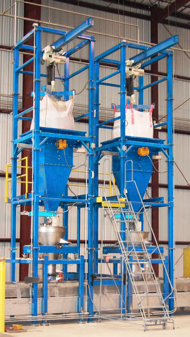 Two bulk bag unloading stations feeding loss-in-weight vibratory feeders