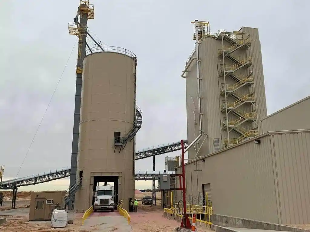 Bolted silo drive through bulk loadout configuration